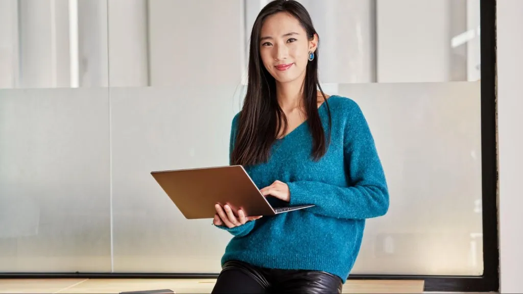 Social media manager workspace with multiple screens showing analytics and content