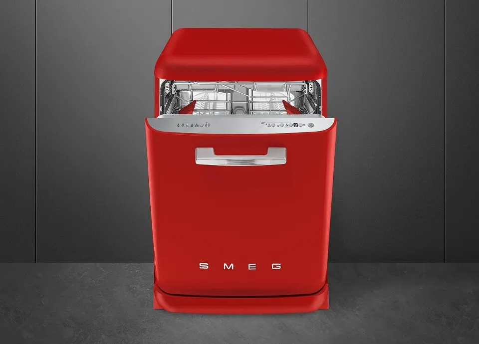 Bright red SMEG dishwasher with the door open and metal racks visible.